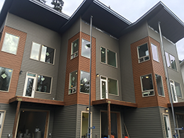 Alaskan townhomes with modern siding.